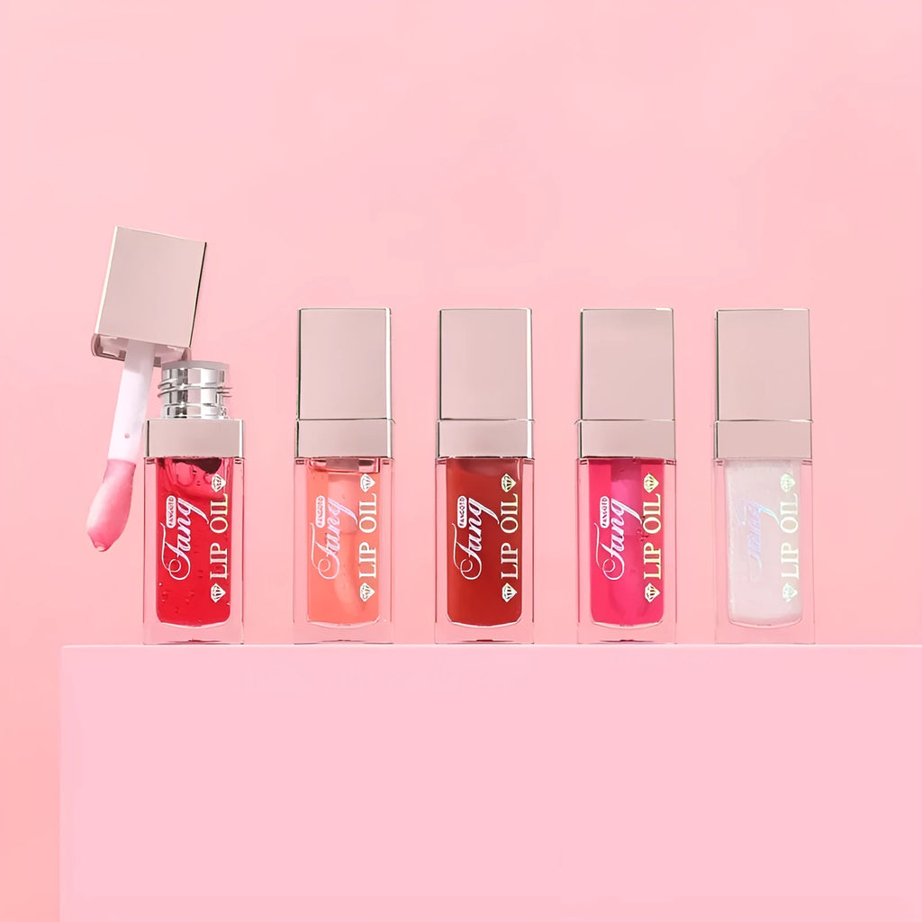Five colour options of bright lip gloss mint lipstick with lip essence oil applicator