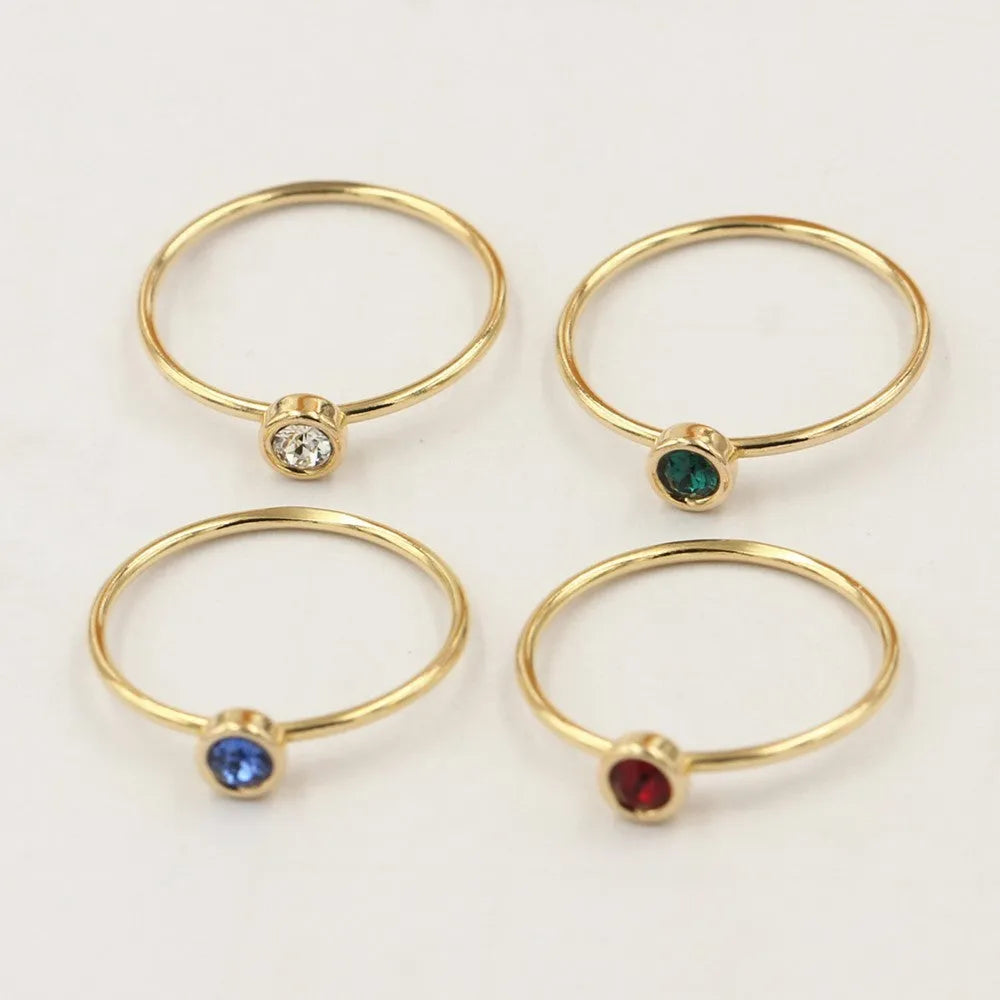Women's knuckle ring with gilded GF setting and zircon stones on adjustable copper band