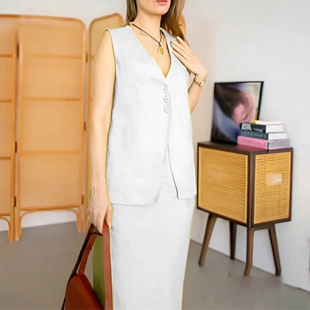 White sleeveless vest and long maxi skirt two-piece casual suit on a hanger.