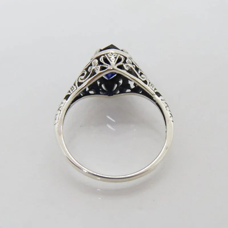 Silver geometric hollow women's ring in electroplated alloy showing openwork pattern