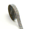 A long strip of electroplated glass self-adhesive water drill for clothing decoration in white and AB colour.