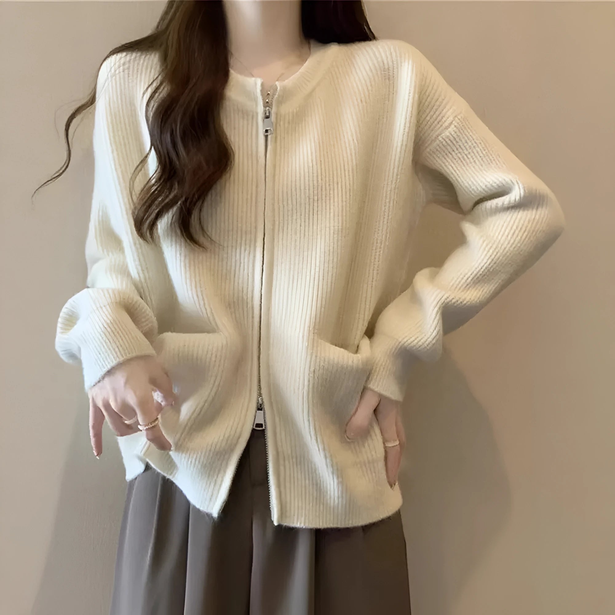 Soft viscose sweater coat in beige colour with long sleeves and cardigan style