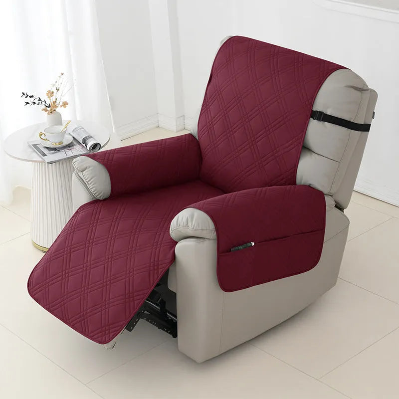 Quilted waterproof sofa cover for a Chivas massage chair in a navy blue colour.
