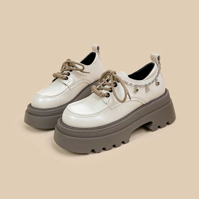 White women's platform leather shoes with chunky heel and front lace-up, round toe.