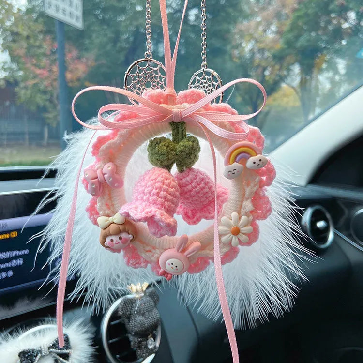 Woven wool bell orchid car pendant in green, pink, purple, and yellow colours with dream catcher option.