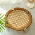 Brown woven rattan square pet hammock bed for cats and dogs, elevated off the ground.