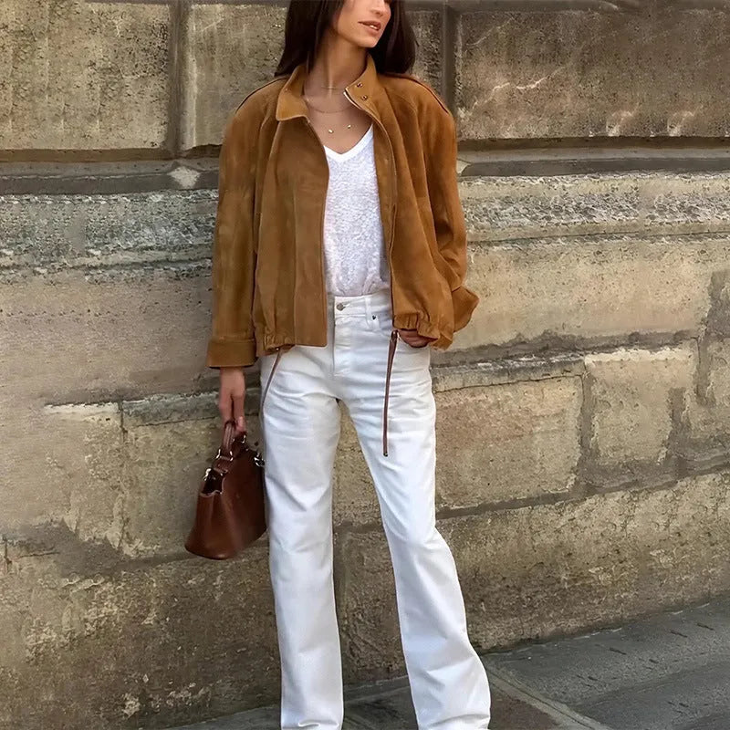 Retro loose fit solid colour polyester jacket with long sleeves on a model.