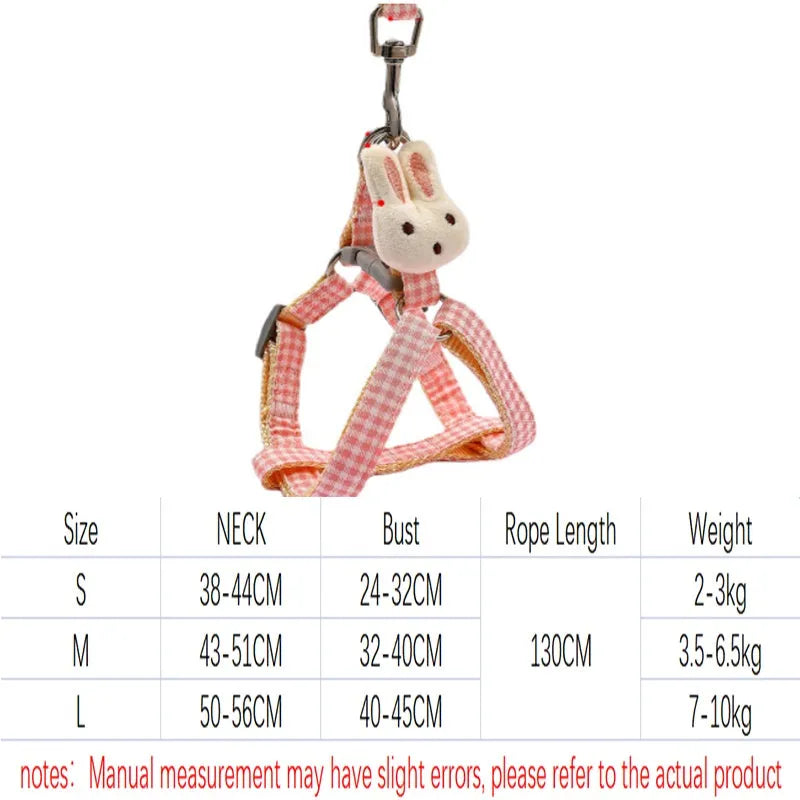 Blue quick-release nylon harness and leash set for a small dog on a white background.