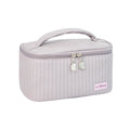 Open-top makeup bag in PU leather showing rectangular shape and solid colour options