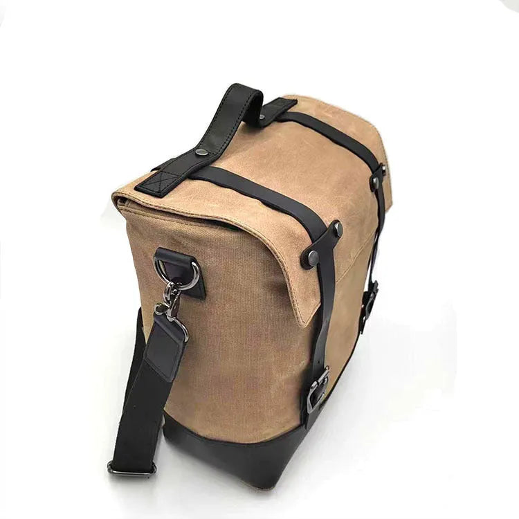 Black waterproof canvas motorcycle side bag with cowhide accents showing 300×280×150mm dimensions