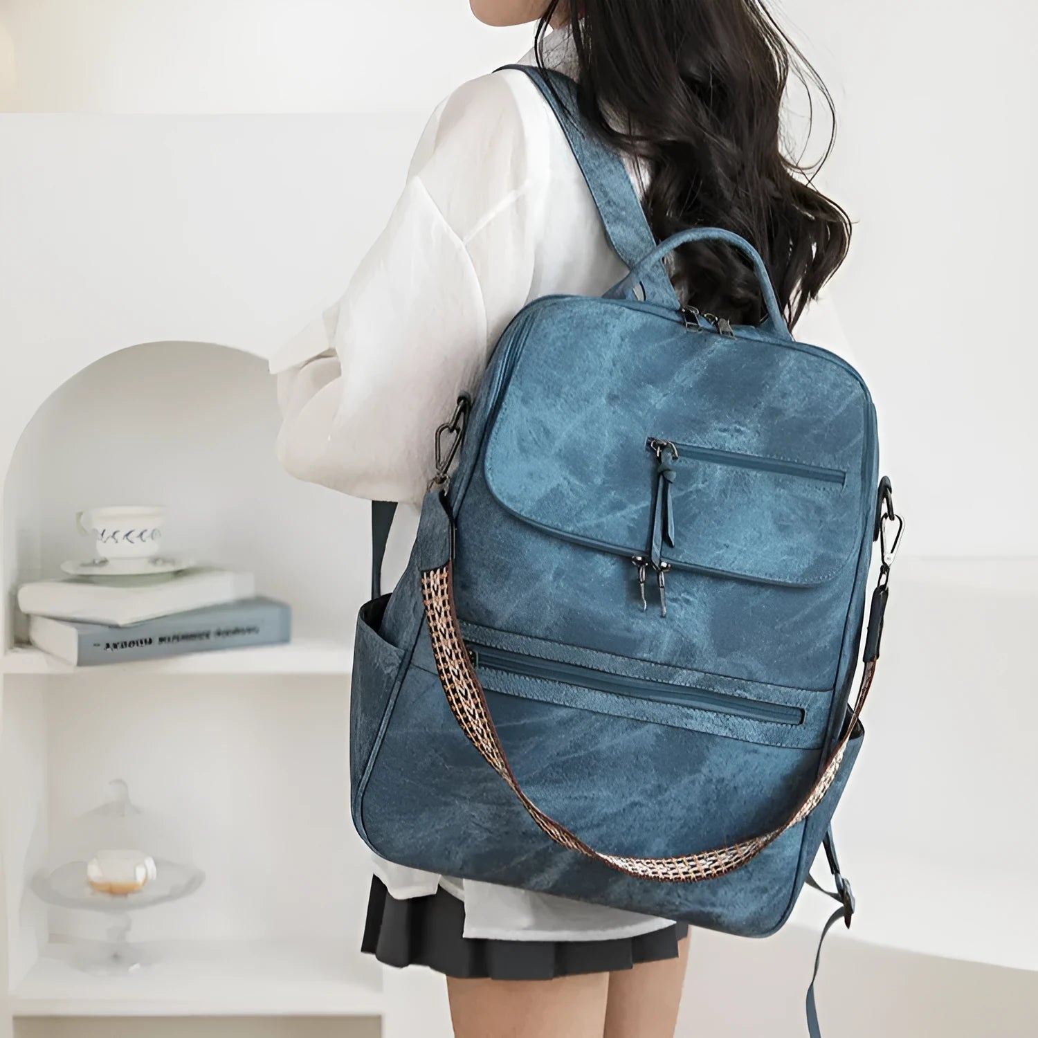 Retro college student backpack in PU leather with curved shoulder straps and solid colour options