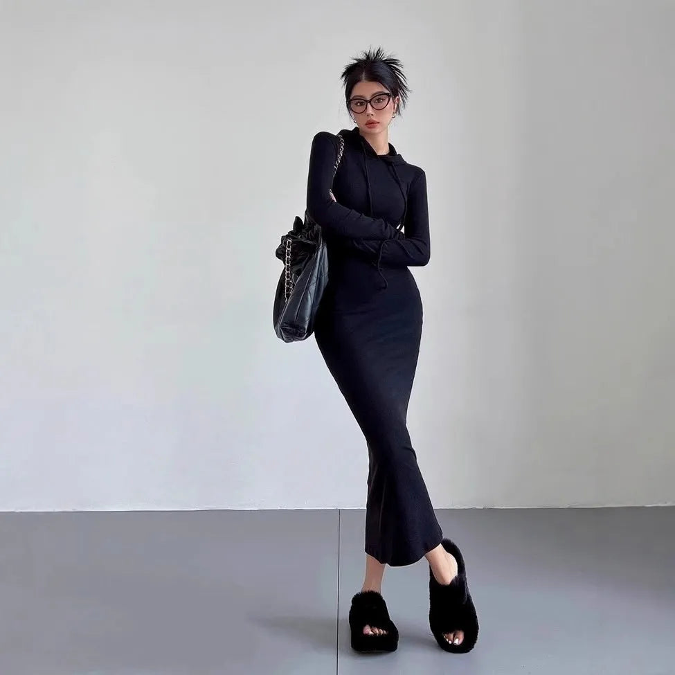 Women's grey hooded long sleeve sheath dress with a high waist and knee-length skirt.