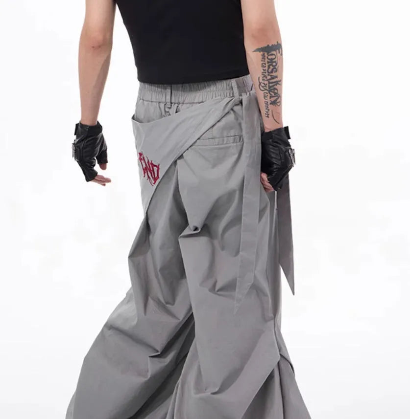 Boy modelling black wide-leg Korean-style casual trousers.