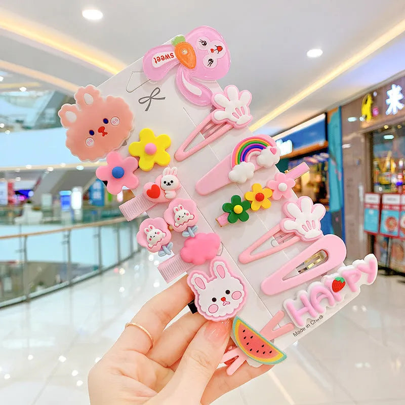 14 piece toddler hair accessories set with rainbow, candy fruit, and butterfly designs in bright colours