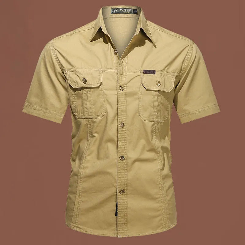 Men's short sleeve cotton work shirt in loose fit cardigan style showing non-ironing construction