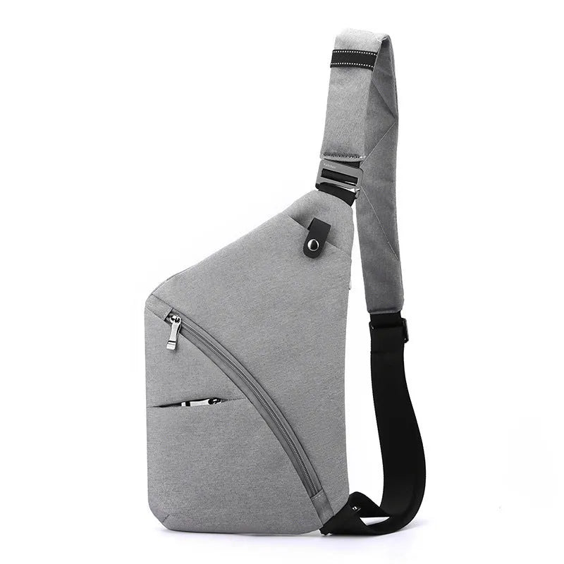 Grey men's oxford cloth chest bag with letter detail, worn on the shoulder.