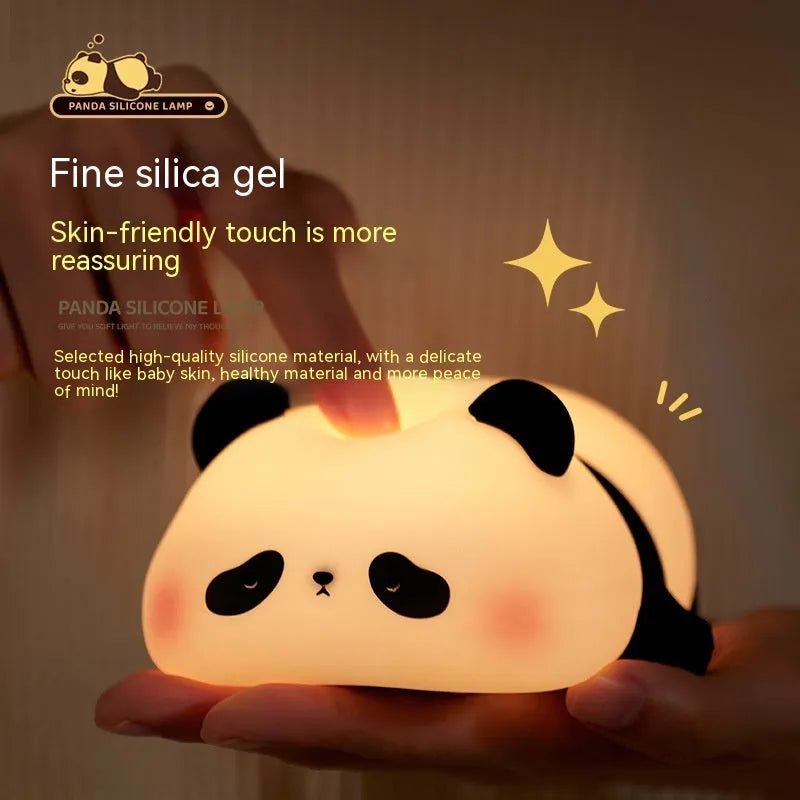 Panda-shaped night light with warm white LED glow and silicone construction