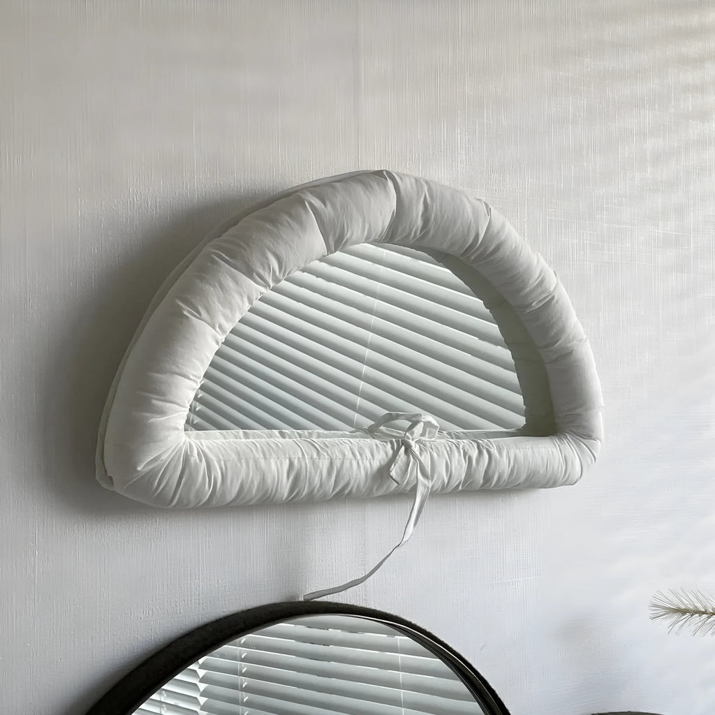 Rectangular hanging fabric mirror background panel with cotton-filled PVC construction