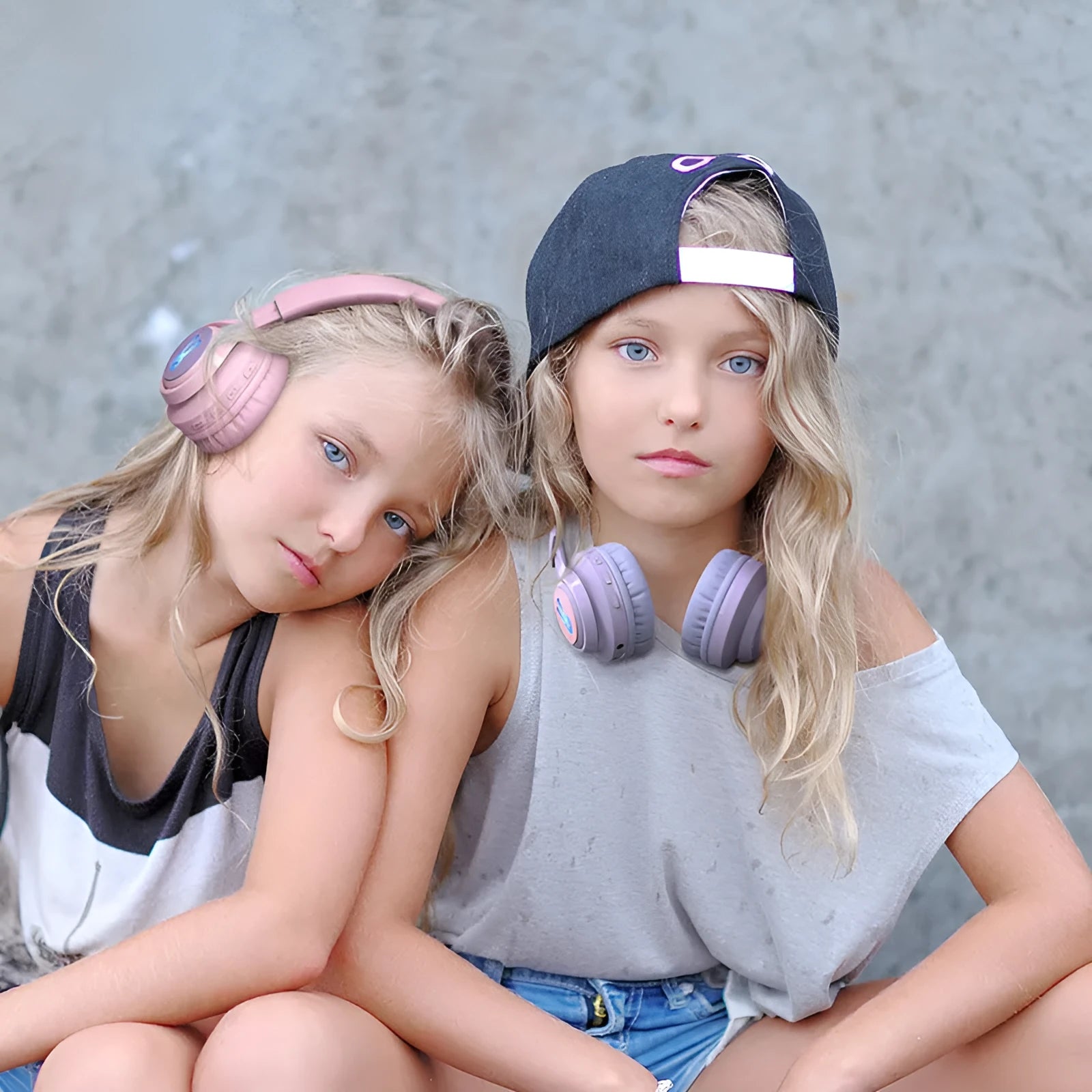 Wireless RGB children's headphones in bunny pink colour with lights on