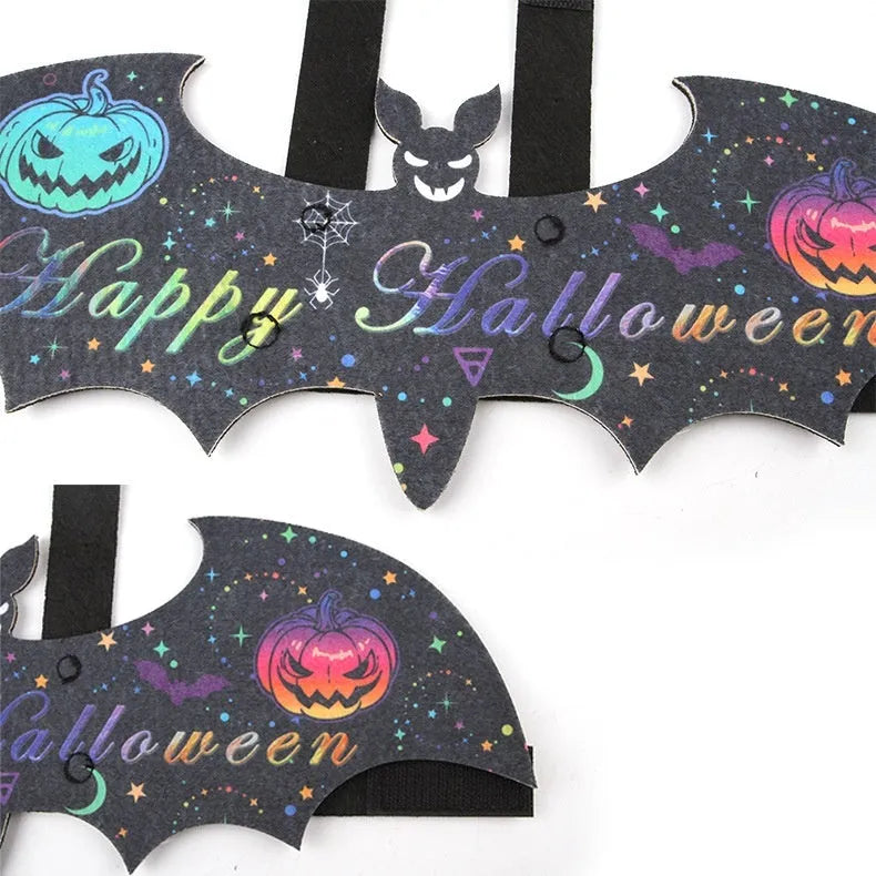 Orange and black batwing costume on a cat for Halloween, with felt fabric and optional bell.