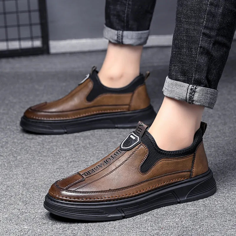 Men's black and brown casual leather shoes with round toe design showing front and side views