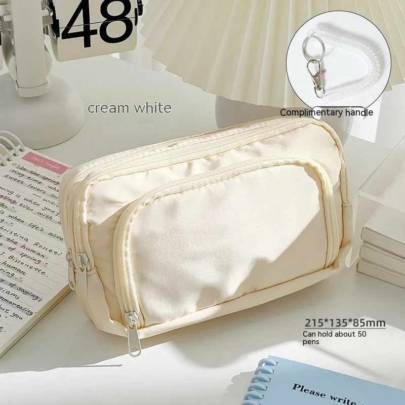 Double layer pencil case with gift handle in blue, pink, green or cream colours