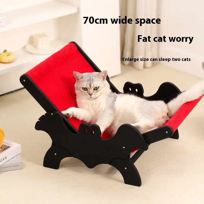 Black and red Halloween themed wooden cat recliner bed on elevated platform