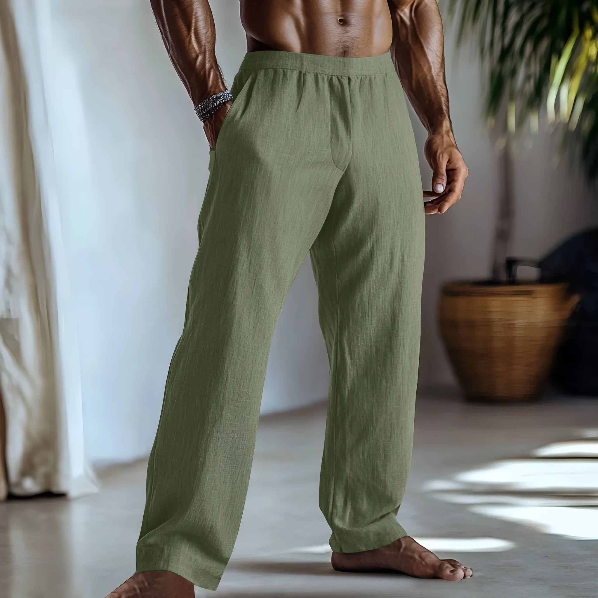 Straight leg cotton linen casual trousers with pockets shown in a solid colour.