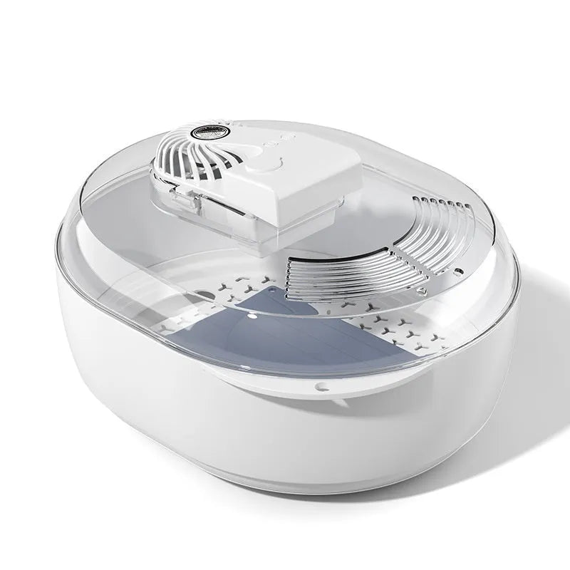 A modern aluminium household defrosting plate with a USB cable on a kitchen worktop.