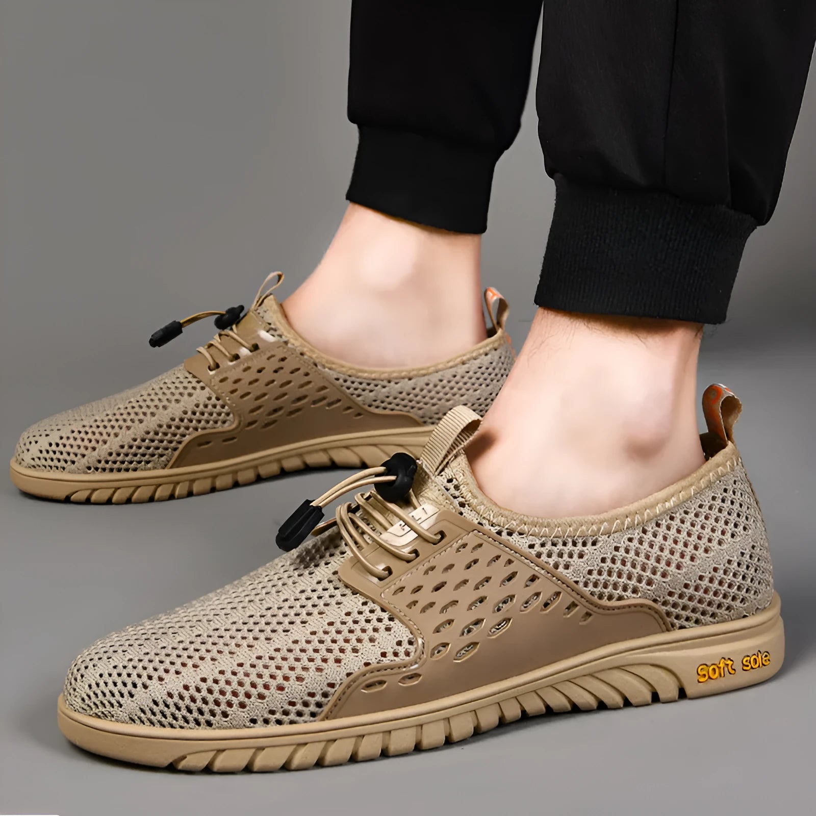 Men's black breathable mesh casual summer shoes with elastic slip-on band and rubber sole