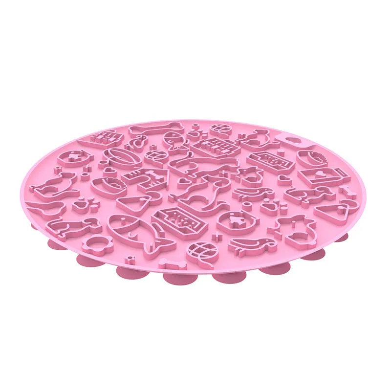 Round silicone pet licking mat with suction cup base in blue colour on a kitchen floor