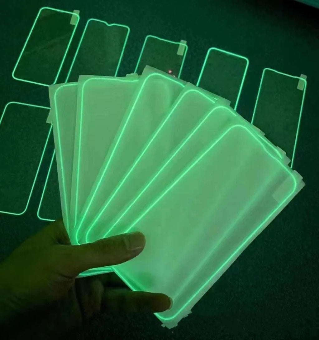 Fluorescent tempered glass screen film for iPhone showing luminous green glow effect