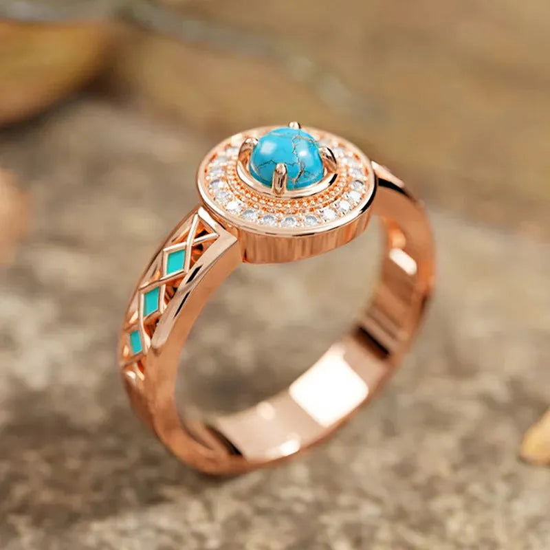 Rose gold coloured copper ethnic ring with geometric design and oil micro inlaid zircon detail.