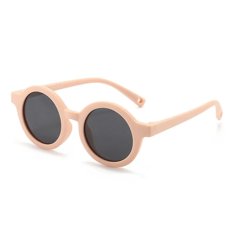 Soft silicone round-frame sunglasses for babies and toddlers aged 0-3 years with polarised UV400 lenses.