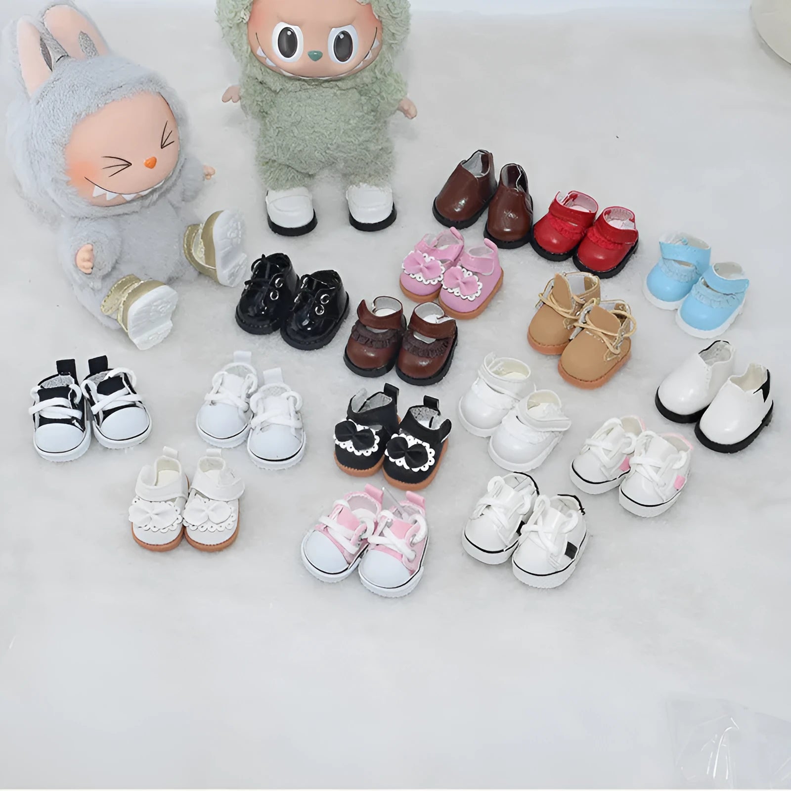 A pair of 17cm high PU replacement shoes for dolls in a selected style and colour.