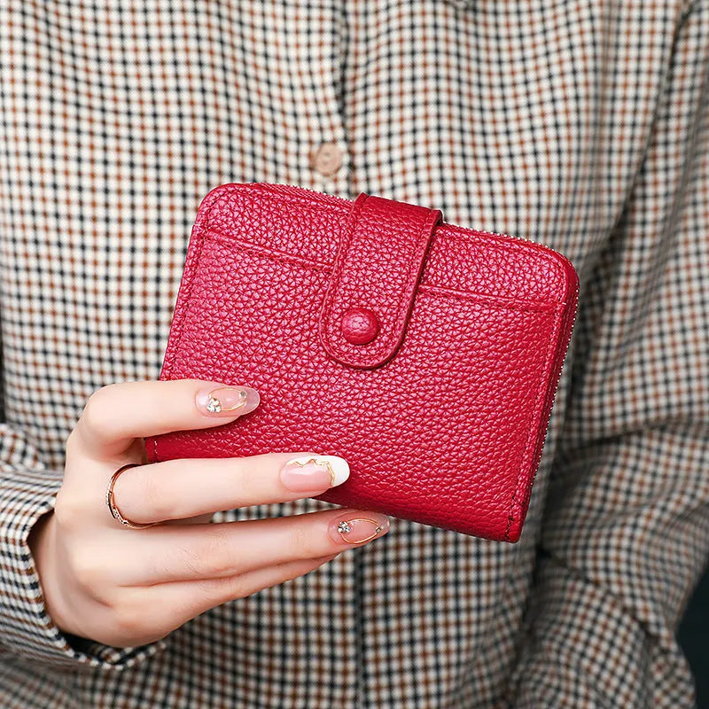 Lychee pattern short wallet in beige with organiser compartments and sewing thread detailing