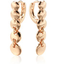 Retro long round copper earrings with woven design in a gold colour finish.
