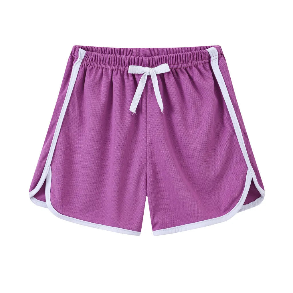 Children's polyester beach shorts in multiple prints and solid colours with size range 100-140cm