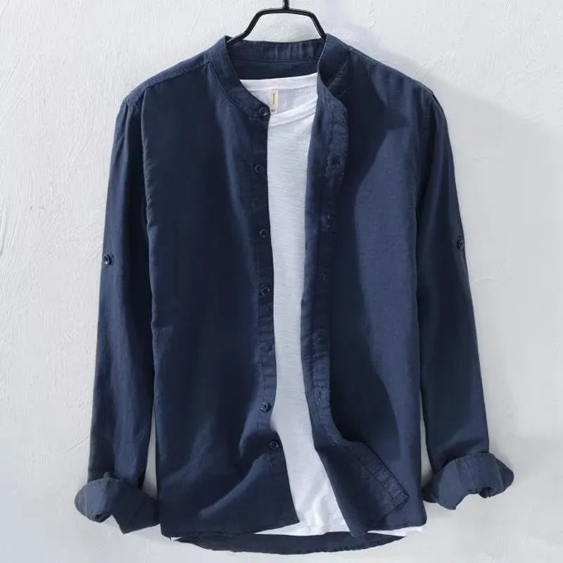 Man wearing a loose fit light blue long sleeve linen casual shirt