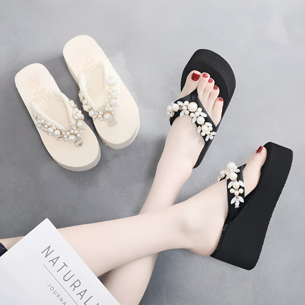 Women's black cotton high-heeled flip-flops on a white background