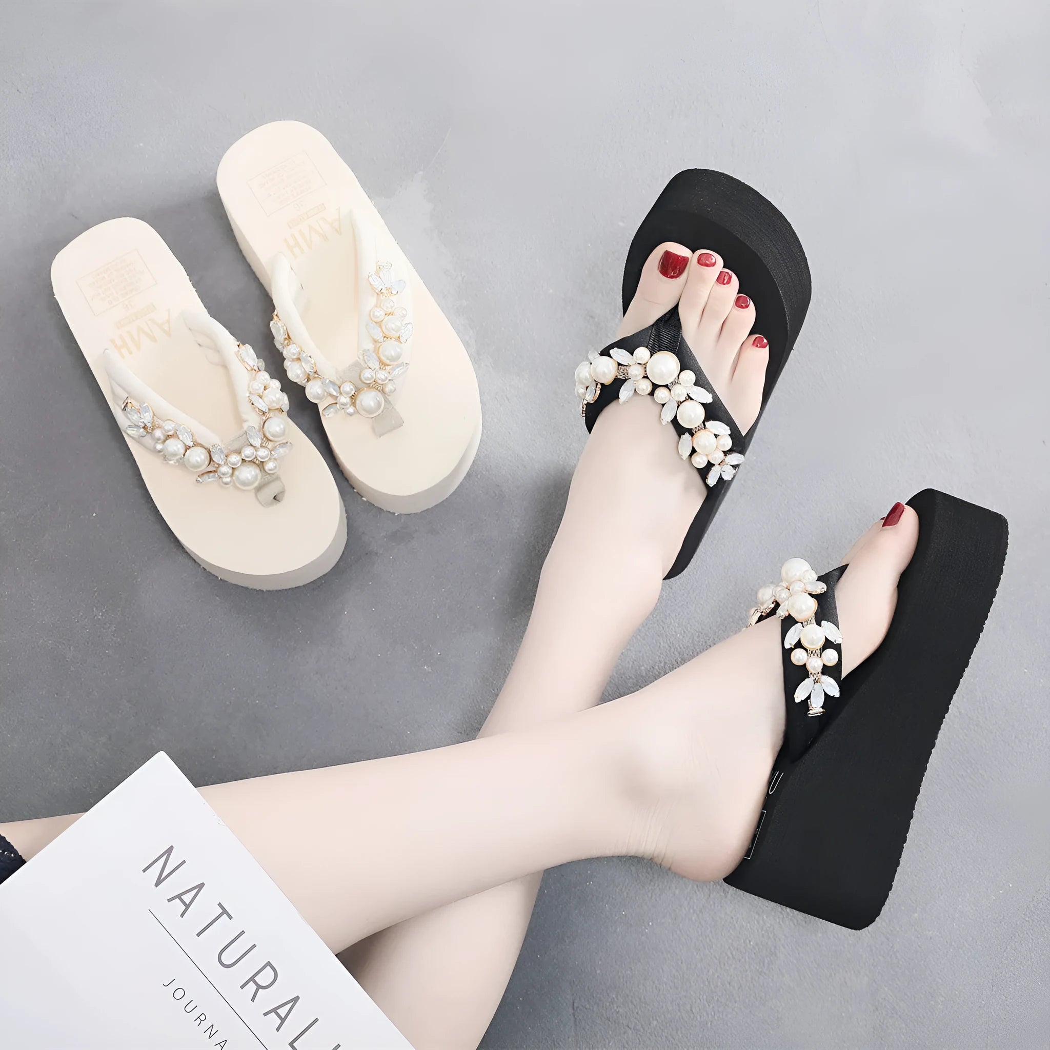 Women's black cotton high-heeled flip-flops on a white background