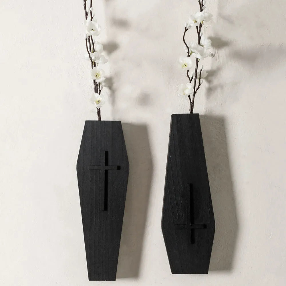 Wooden cross-shaped wall shelf with display area measuring 27 by 9 centimetres
