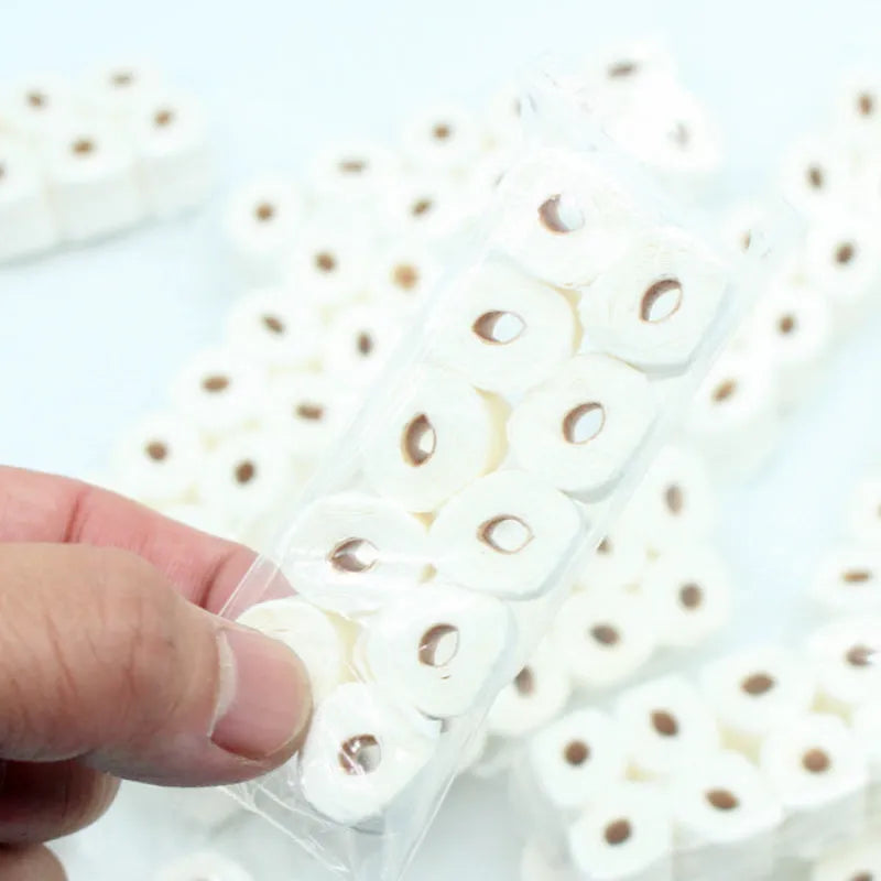 Simulated paper tissue roll model measuring 30x15x80mm for children's pretend play