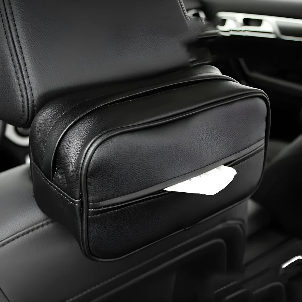 Black PU leather hanging storage box for car console organisation, shown with paper bag filler.