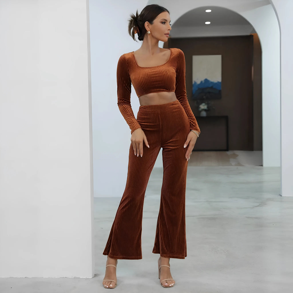 Caramel coloured women's long sleeve sweater set with matching trousers on a hanger.