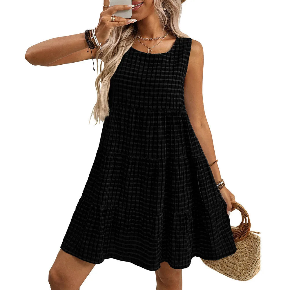Women's light blue sleeveless plaid dress with high waist and swing skirt on a hanger.