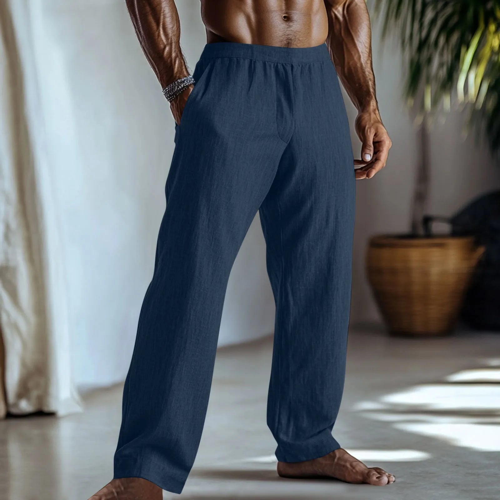Straight leg cotton linen trousers in light green colour showing front view with pockets