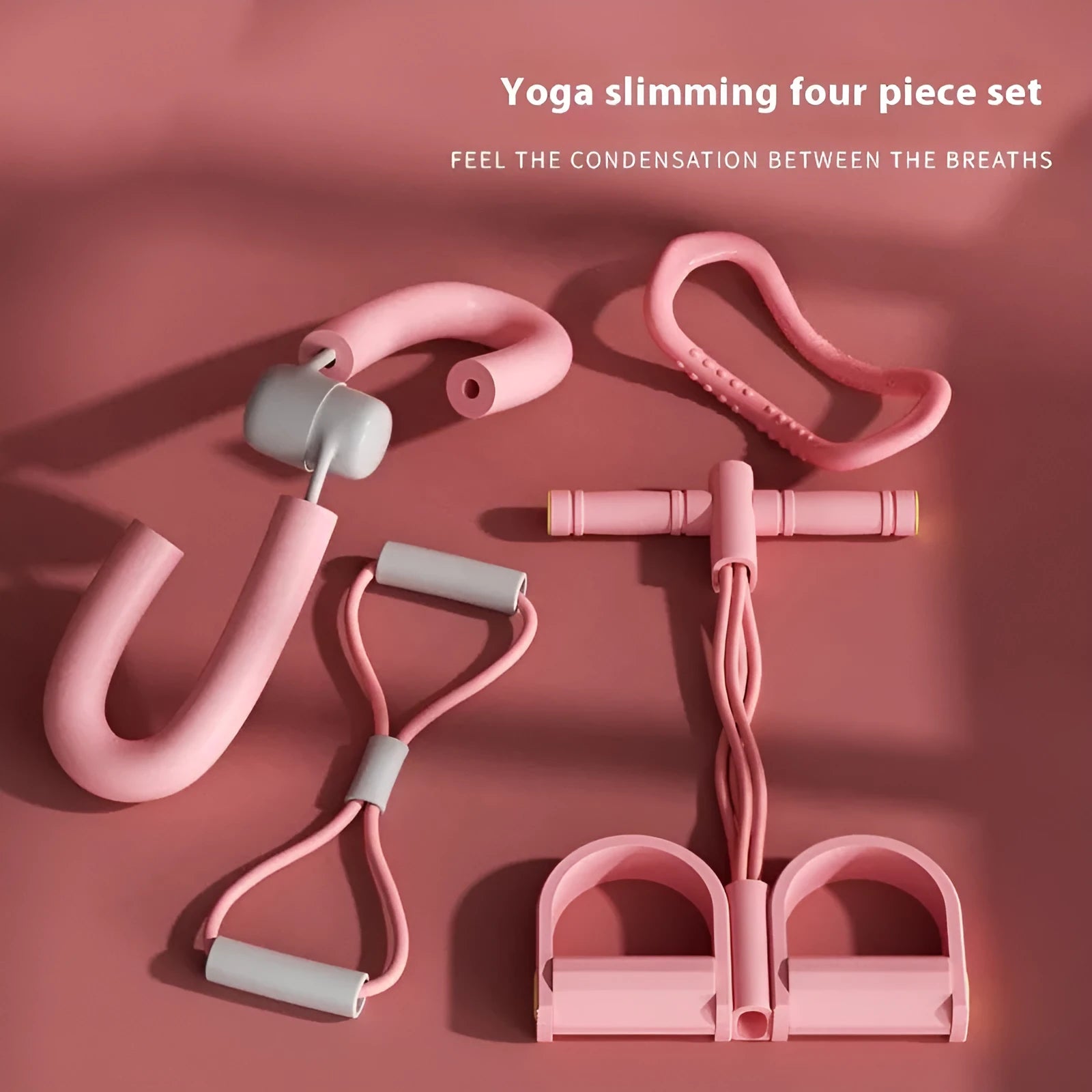 Yoga four piece set showing leg stretching device, foot pedaler, yoga ring, and figure eight tension rope.