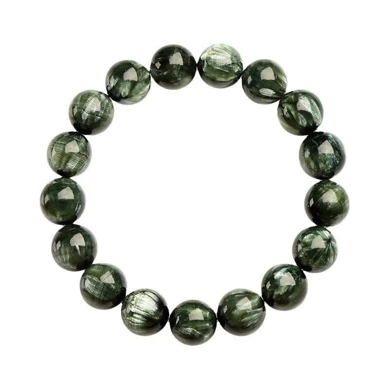 Green dragon crystal bracelet with geometric round beads showing ruyi symbolism detail