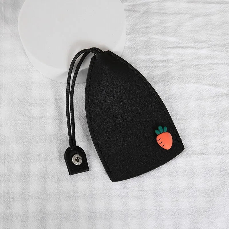 Colourful cartoon pull-out key case made from PU leather showing design options